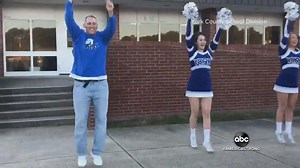359K views · 17K reactions | CHEER DAD: Proud father Hekili Holland, of Yorktown, Virginia, has watched daughter Mackenzi's cheerleader squad so many times he knows the Falcons cheer by heart – and he's not afraid to show it. David Muir reports. #AmericaStrong https://abcn.ws/32olv1O | ABC World News Tonight with David Muir | Facebook
