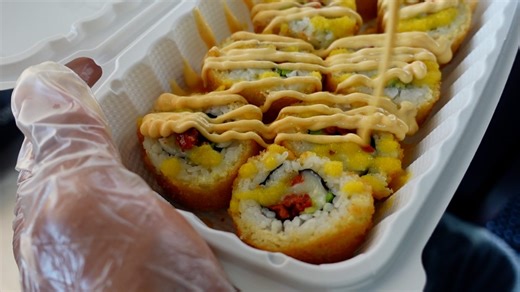 Inside a 'sushi-Mexican fusion' truck serving Hot Cheeto dusted rolls | Neighborhood Eats