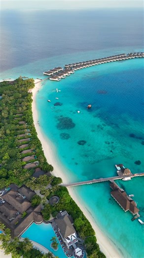 Where sky meets the ocean in perfect harmony. From the air, Seaside Finolhu Baa Atoll unveils its barefoot luxury, overwater villas, beach sanctuaries, and endless shades of turquoise as far as the eye can see. #SeasideCollection #RelaxAtFinolhu #OverwaterVillas #BeachVillaBliss #BarefootLuxury #EndlessMoments #TurquoiseDreams #OceanFrontLuxury #MaldivesResort #BaaAtollBeauty | Finolhu Baa Atoll