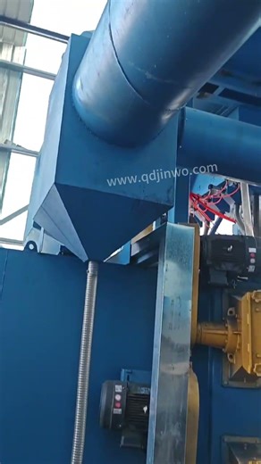 Through-type shot blasting machine with continuous automatic feeding and discharging.
