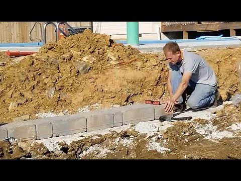 Building a retaining wall around my raised pool area using Belgard Castlemanor Grana wall blocks