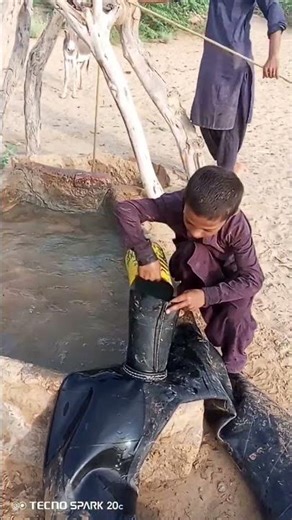 Little Boy Filling Water Tube