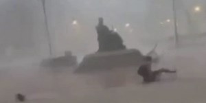 Video shows Kentucky student knocked off feet by severe storm's wind