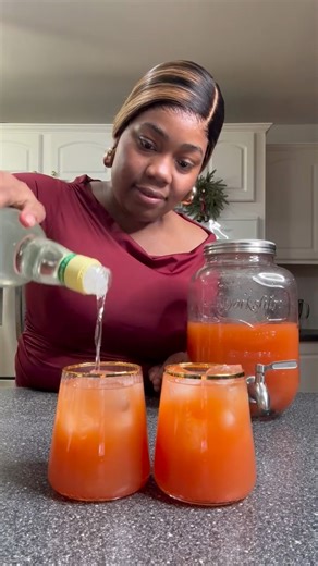 This is a classic Jamaican-style rum punch made the traditional way: strong, weak, sweet, and sour. Fruit punch, pineapple juice, fresh lime, bitters, and rum . Simple ingredients with big flavor and real memories. If it don’t have lime and bitters, it’s not rum punch. How strong you making yours? 👀🍹 ⸻ #rumpunch #jamaicandrinks #caribbeancocktails #Khaliaskuisine #fblifestyle #holidaydrinks | Khalia’s Kuisine