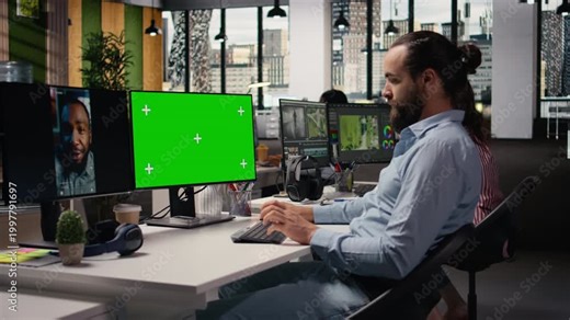 Chroma key screen, PC reels on software, in modern office, startup employee developing marketing strategy used in targeting viral trends and boosting online followers and exposure.