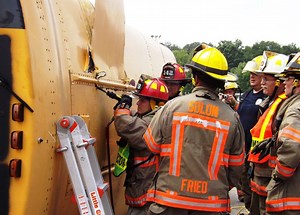 PHOTOS: Firefighters Train With Overturned School Bus