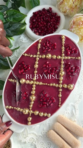RUBYMISU🌹❤️🍰 Today is Episode 15 of my Tiramisu Series. This stunning pomegranate dessert is a delicious and unique addition to any dessert menu. It’s no-bake and made with homemade pomegranate juice, champagne, a creamy mascarpone filling, and ladyfingers. The topping is inspired by ruby jewelry and features a smooth pomegranate sauce base, criss-cross gold sprinkles, and heart-shaped pomegranate arils. The perfect romantic dessert for the month of love and all pomegranate lovers. Ingredients