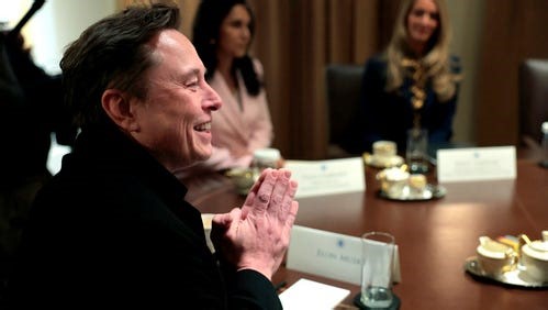 'Truly a moron': Elon Musk claps at trade advisor Peter Navarro over CNBC tariff comments