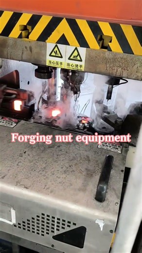 Robotic arms precisely handle glowing steel, forging perfect nuts in seconds. #Forging #Automation