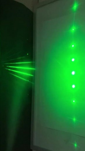 Laser, diffraction grating and smoke spray