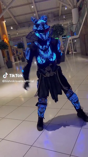 Futuristic Robot Costume Showcased in Public Space