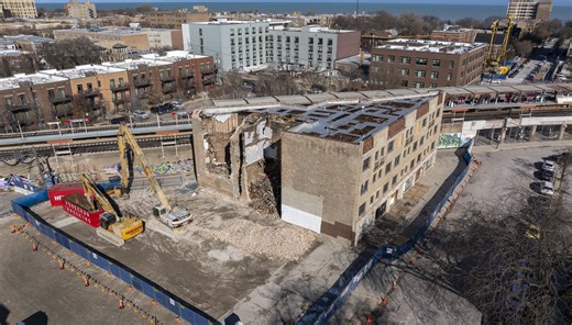Loyola University starts demolition on Rogers Park flatiron building