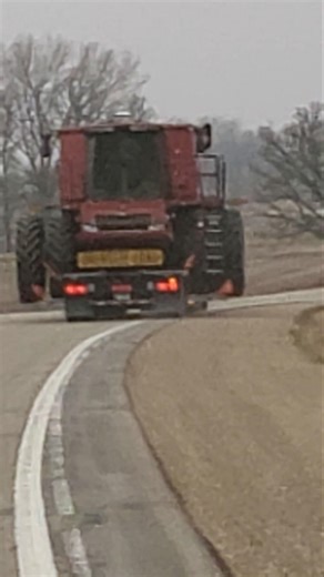 Case IH combine wide load cruising down the highway #overtheroad