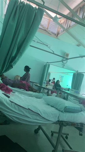 Inside a Hospital Ward: Patients and Caregiving Scenes