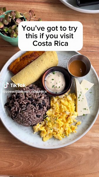 If you visit Costa Rica, you have to try a típico breakfast 🍳🍚☕️ It’s a local classic: gallo pinto (rice & beans), eggs, fried plantains, fresh cheese, tortillas, and a big ol’ cup of strong Costa Rican coffee. Simple, filling, and soooo good. Pura vida on a plate!🌴 #CostaRicaEats #GalloPinto #TípicoBreakfast #PuraVida #TravelCostaRica #costarica🇨🇷