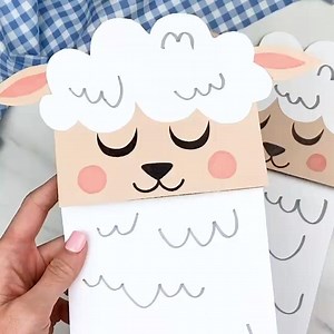 This easy paper bag sheep craft is so fun and easy for spring or Easter! Template here: https://www.simpleeverydaymom.com/sheep-paper-bag-puppet/ | Simple Everyday Mom
