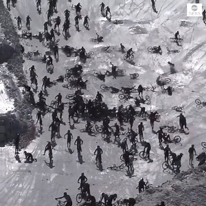 1M views · 6.2K reactions | CHAIN REACTION: Hundreds of riders hurtle down an icy cliff and crash into one another as "Mountain of Hell" downhill bike race lives up to its name. https://abcn.ws/2JbmziZ | ABC News | Facebook