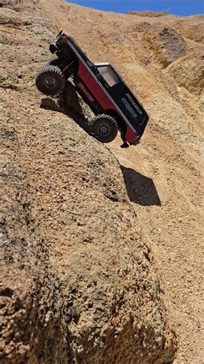 trx4 bronco on the trail crawling, some rocks.