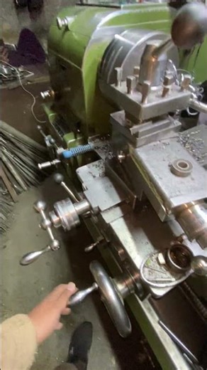 Hard metal shaft cutting process in sharp tool in lathe machine