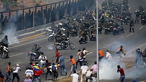 Video shows military vehicle running over protesters