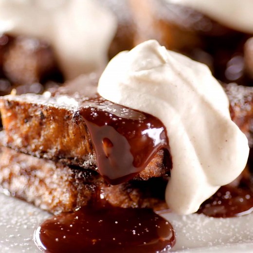 Stuffed Mexican Hot Chocolate French Toast with Cinnamon Whipped Cream and Chocolate-Maple Ganache... say that 10x fast. Save Bobby's crazy-good recipe: http://www.foodtv.com/5fjjs. | Food Network