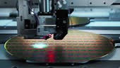 Shot of Silicon Wafer being processed at Semiconductor Foundry, that...