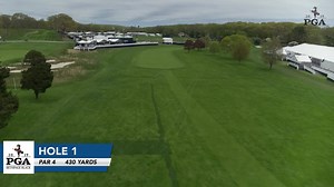 Flyover Hole 1 of Bethpage Black Par 4 | 430 yards The opening shot from an elevated tee bends sharply to the right, but a cluster of trees to the right of the fairway will block any approach from that side. The left side is preferred, for a deep bunker guards the front right of the green. The front third of the green, the smallest on the course, slopes sharply, and approach shots with too much spin could roll off. | PGA Championship