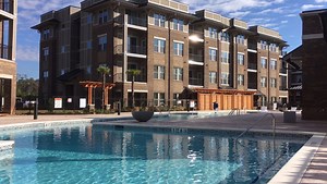 Upscale apartments open off River Watch Parkway