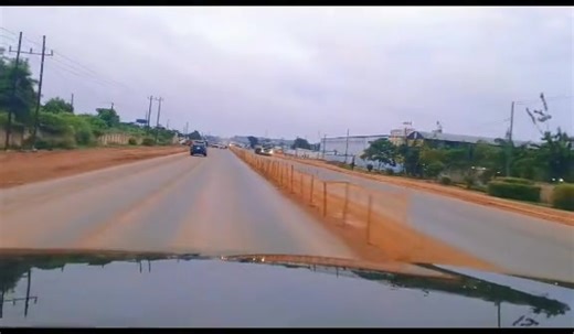 A motorist appreciating the road works that have been done at 10 Miles | Zambian Landscape