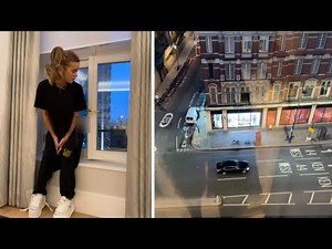 Kate Beckinsale pulling her pants down in front of a window Flashing the London store Harvey Nichols