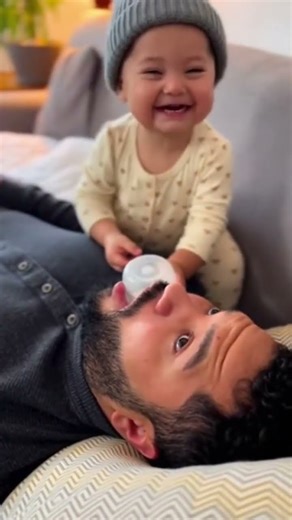 Option 2 (Cute + Funny):Sleeping Dad Gets the Cutest Wake-Up Prank Ever 🍼😂