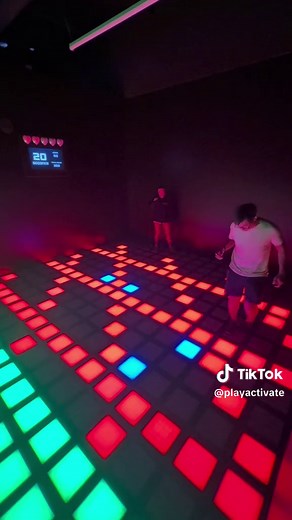 Colorful Dance Floor Performance: A Dynamic Duo