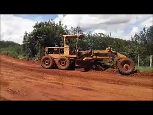 Watch a Motor Grader in Action: Spreading Gravel to Improve Rural Roads - 120B Demonstration!