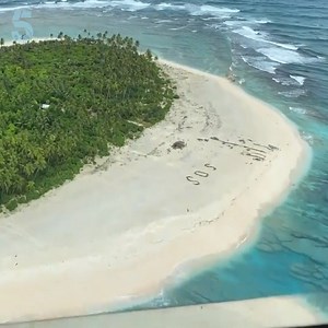 Three men have been rescued from a tiny island after writing a giant SOS sign in the sand - hoping that it would be spotted from above. Their boat was blown off course and ran out of fuel stranding them in the middle of the pacific with no sign of life around. | Channel 5 News