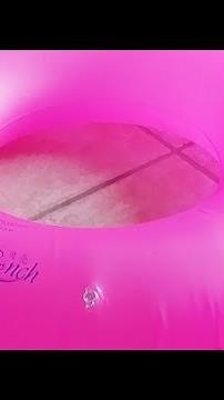 Deflate. Pink inflatable donut