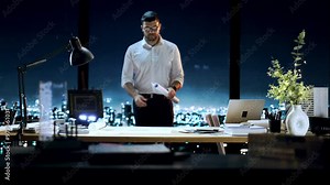 Architect Reviewing Blueprints In High-Rise Office At Night Project Planning Urban Design Innovation