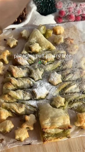 @veggieworldrecipes Pistachio Puff Pastry Trees🎄 Last year I saw so many people trying the Nutella puff pastry Christmas tree trend, and I thought it was absolutely adorable! I thought it would be so much fun to try a green pistachio version, and it did not disappoint🤤 I’ve already made this twice for my family, and they absolutely devoured it each time😂💚 ✨ingredients 1 roll of puff pastry pistachio cream (I used @rhythm108) matcha powder (optional, for color) vegan butter to spread on top p