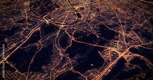 Aerial night view of city of Paris, France. Traffic and street light glowing. Camera flying above space filming cinematic straight and tilting down. 3d animation rendering.
