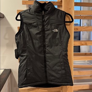 The North Face black  vest with fur interior