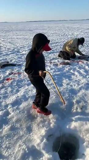 Boy Catches Fish The Same Size as Himself || ViralHog