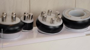 Cosmetology medical device for radio frequency lifting procedure for face skin rejuvenation and anti age at aesthetic cosmetology center. Lifting in beauty. Device for rejuvenation and anti aging