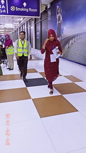 People Walking in Airport Transit Area
