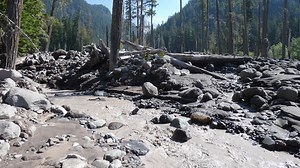 Debris flow carrying mud, rocks closes Mount Rainier park road