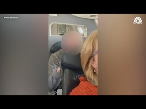 Viral video of seat-punching passenger sparks debate over reclined seats on air planes