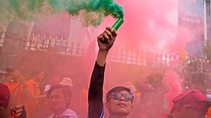 World's workers rally on May Day; France braces for protests