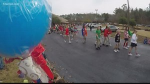 Students parade in their ugliest sweaters