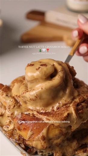Rosie Brown on Instagram: "bakemas part 7 | Toffee nut latte cinnamon rolls 🎄✨ They are soft and gooey, perfectly golden and pillowy the most gorgeous nutty filling that caramelises whilst baking for that true toffee nut flavour. Baked on top of a sticky toffee sauce and finished with a creamy tangy espresso frosting that melts into each roll of dough they are warming and cosy, and I hope you love them just as much as I do. This recipe is part of my exclusive subscriber content and can be acces