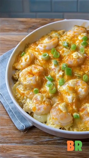 Shrimp Rice and Crab Casserole A creamy coastal casserole where tender shrimp and sweet crab rest over seasoned rice, wrapped in gentle warmth and soft spice. Each spoonful is rich and comforting, with the quiet elegance of a seaside supper served straight from the oven. 🦐 Ingredients : 2 packages (8.8 ounces each) ready-to-serve long grain and wild rice 1/4 cup unsalted butter, cubed 2 celery ribs, chopped 1 medium onion, chopped 3 tablespoons all-purpose flour 1 1/2 cups half-and-half cream 1