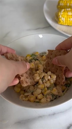 Inspired by elotes and built for summer snacking, this Wasa Sourdough Crispbread stack brings that festival flair to every bite. 🌽✨ Save this now and thank yourself later! What You Need: Wasa Sourdough Crispbread 3 ears of corn, husked 1 bunch of cilantro, roughly chopped 3 tablespoons mayonnaise ½ lime, juiced Red pepper flakes, to taste What To Do: In a pot of boiling water, cook the corn for 3–5 minutes or until tender. Once cooked, set aside to cool. When cooled, cut the kernels off the cob