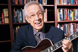 Guitarist Kenny Burrell shouldn’t be in trouble. But he is.